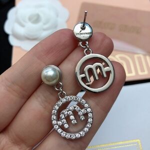 miumiu ear hook ear clap